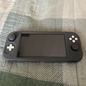 Nintendo Switch Lite with protective cover and screen protector